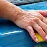 Hand washing a car exterior